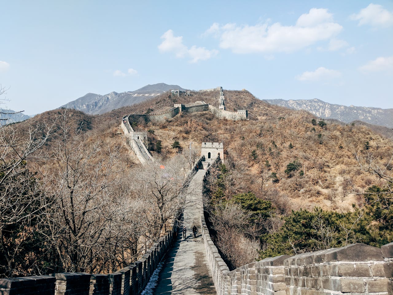 Scenic view of the Great Wall of China winding through the mountains near Beijing in autumn.